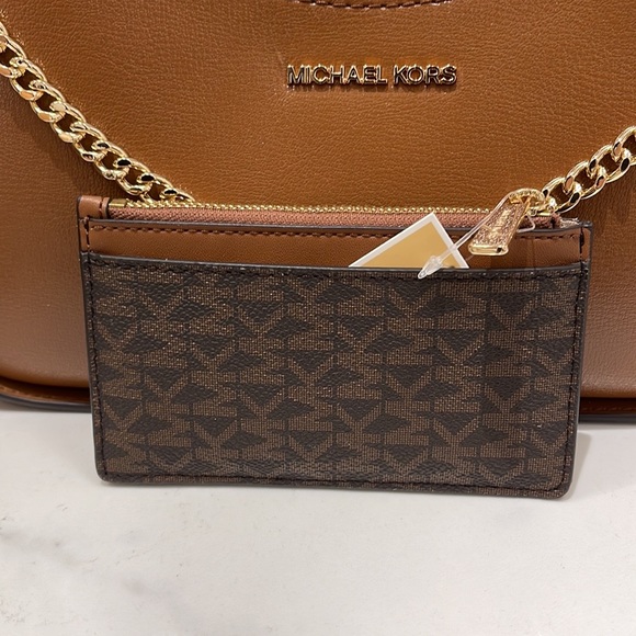 Michael Kors Jet Set Travel Medium Top Zip Card Case Wallet

Brown 
NWT - Picture 5 of 16